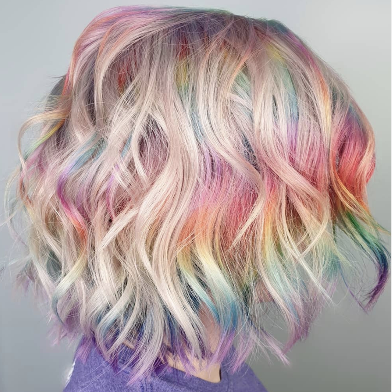 Woman with short, rainbow hair