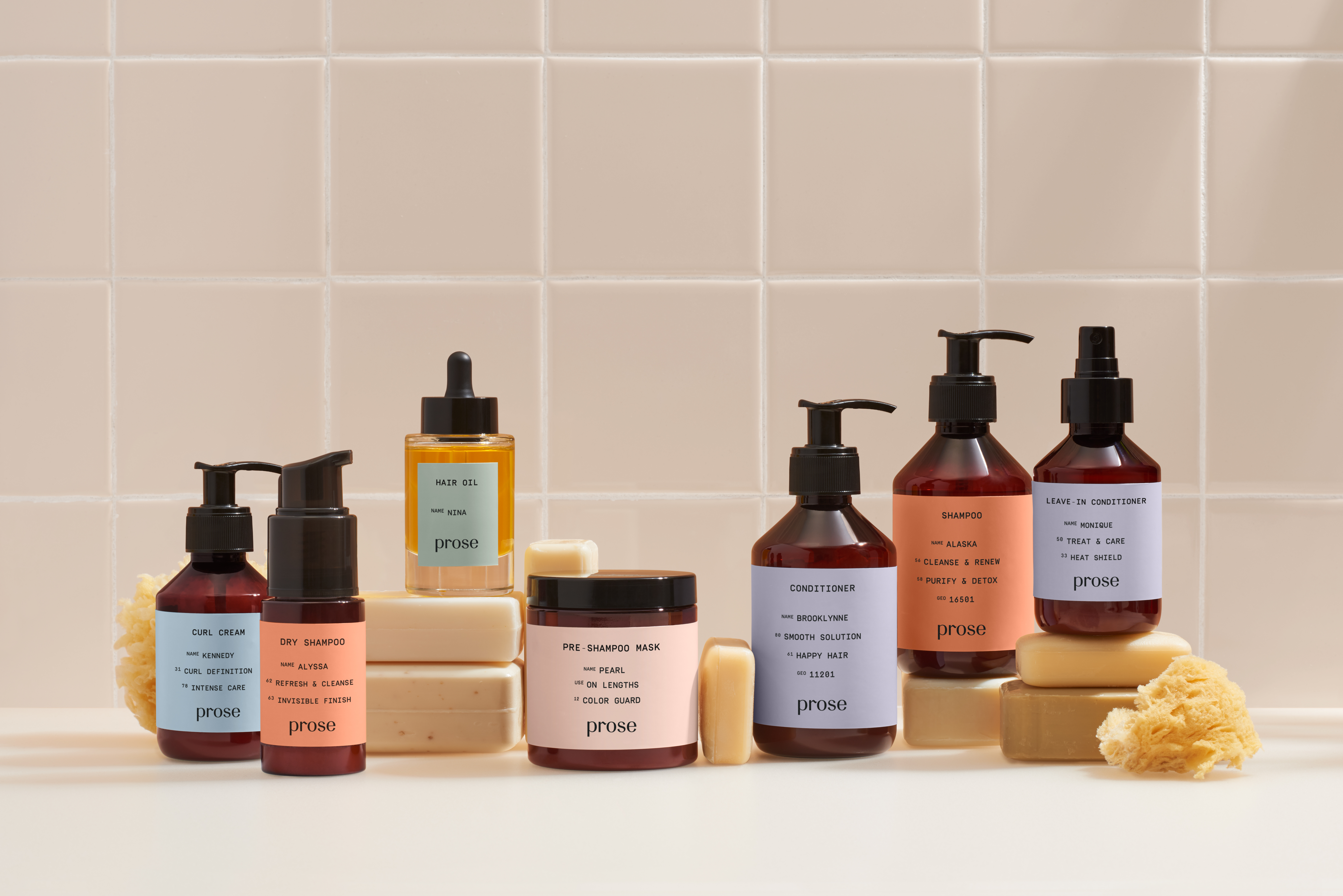 lineup of all prose products against a tan bathroom background