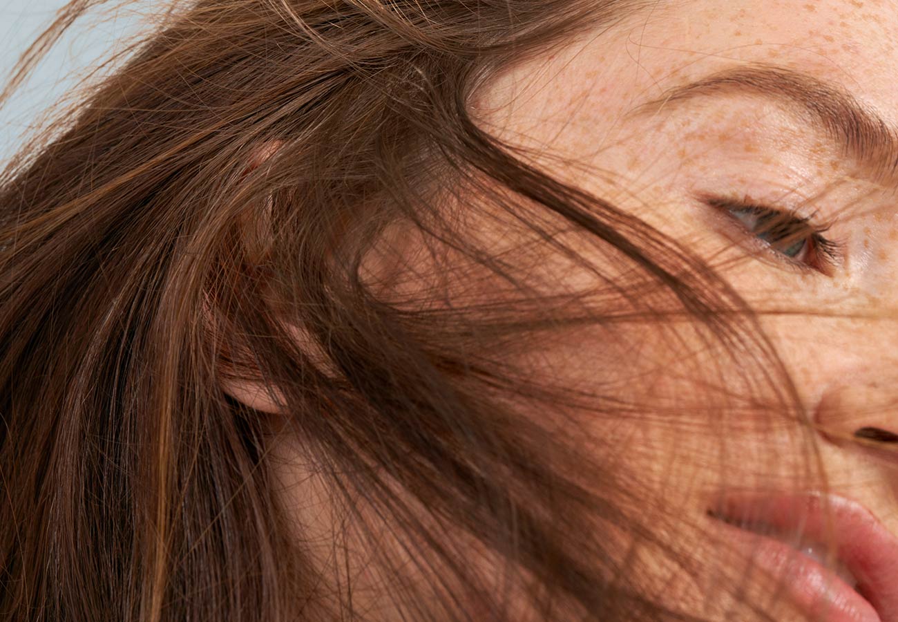 woman with brown, straight hair