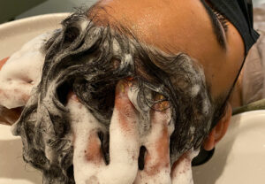 woman washing hair scalp care