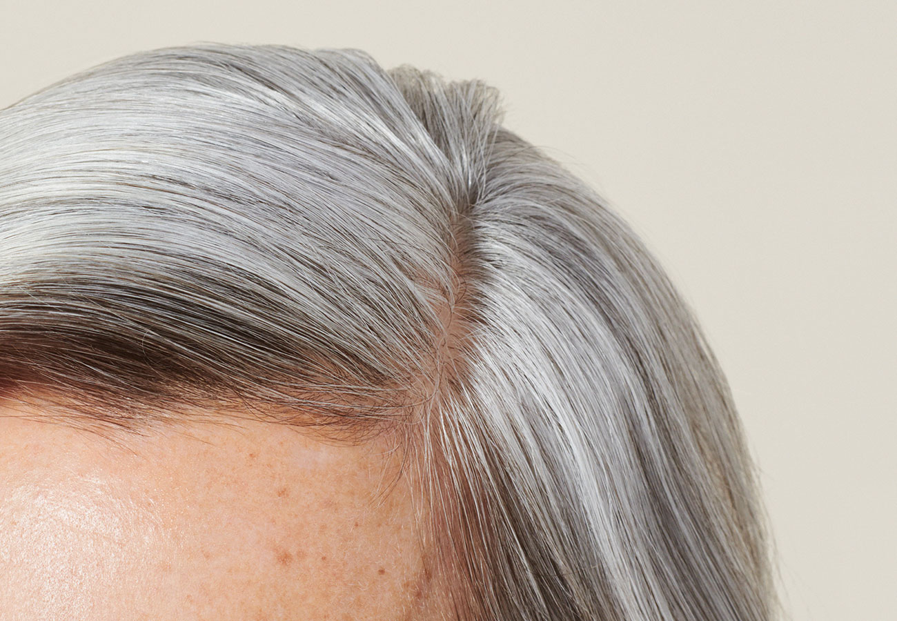 close up image of a woman's scalp