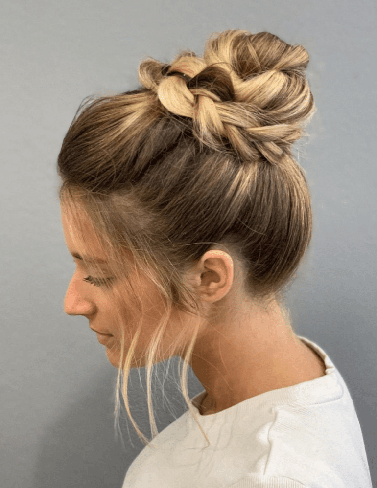 blonde woman with a pouf hairstyle