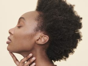 woman with short, curly hair with natural hair styles