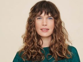 woman with brown, wavy hair